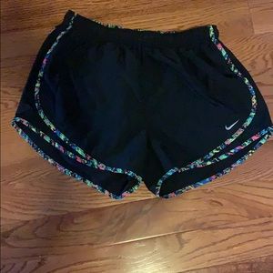 Black Nike running shorts